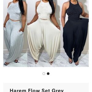 Cute 2 piece outfit. Never worn. Selling both for the price of one!!!!!